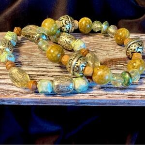 Two bracelets wood with crystals & green silver and tan beads